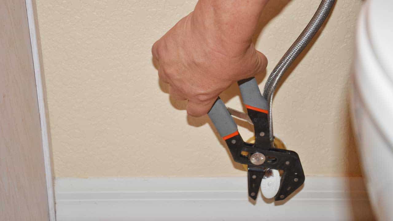 using a special wrench called channel locks, to turn water shut off valve in order to repair a leak in the toilet supply line ... but decide up front if plumbing falls on your DIY list or hiring a plumber, depending on your homeowner personality