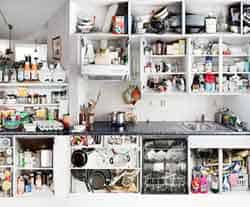 kitchen design includes storage to hide clutter