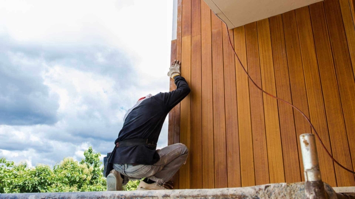 Installing new fiber-cement siding, one of today's more popular home exterior materials ...