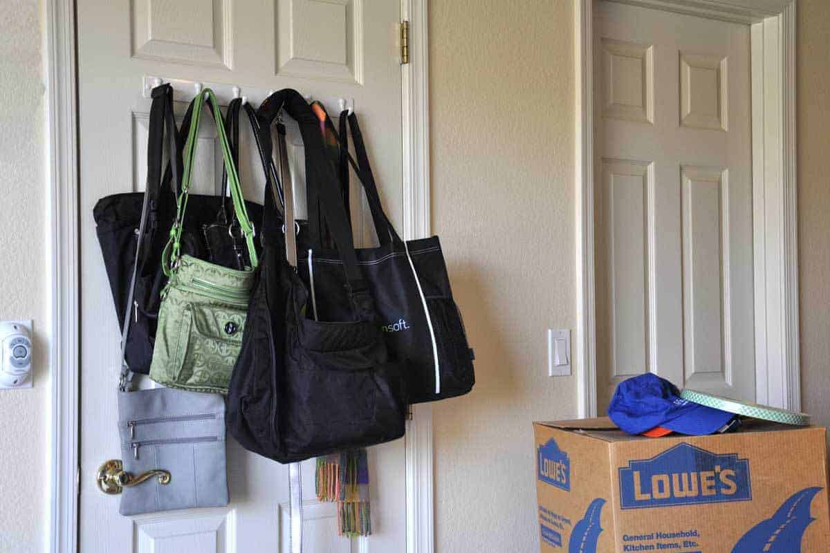 staying organized is easier with hooks for things, often hidden behind doors  