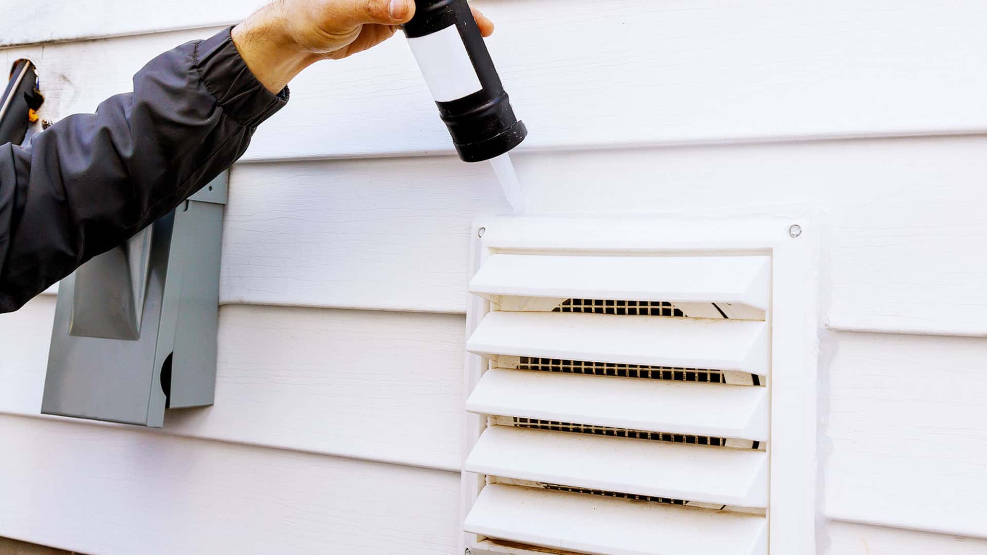 Caulking around the dryer vent to keep water from getting into your home ...