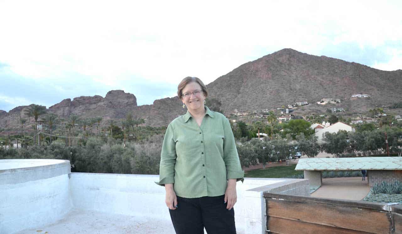 Tina Gleisner, founder of Home Tips for Women, enjoying the view atop the David Wright mid-century modern home 