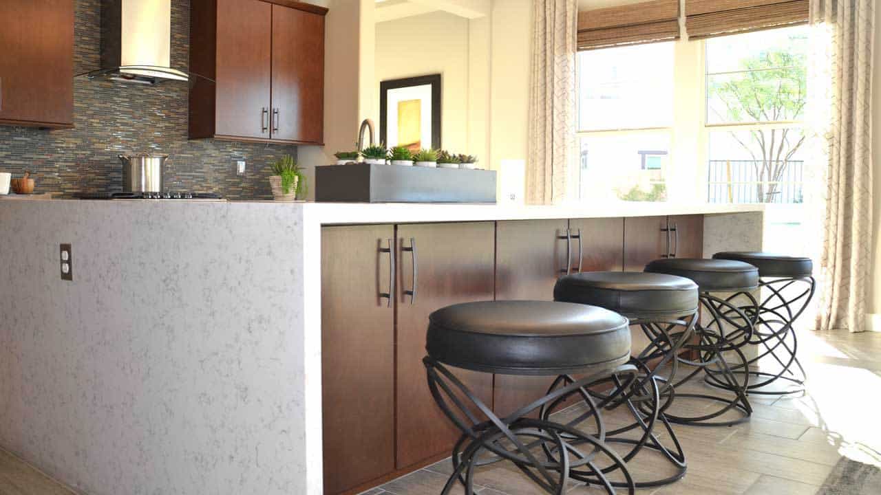 finally able to photograph the new waterfall kitchen island design at a model home