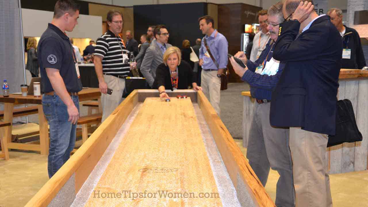 just like relaxing at home, a home show for professionals needs ways to slow down & relax for a few minutes of ... shuffleboard?