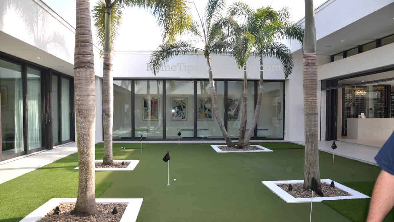 an active lifestyle for a dedicated golfer could include a putting green like this one