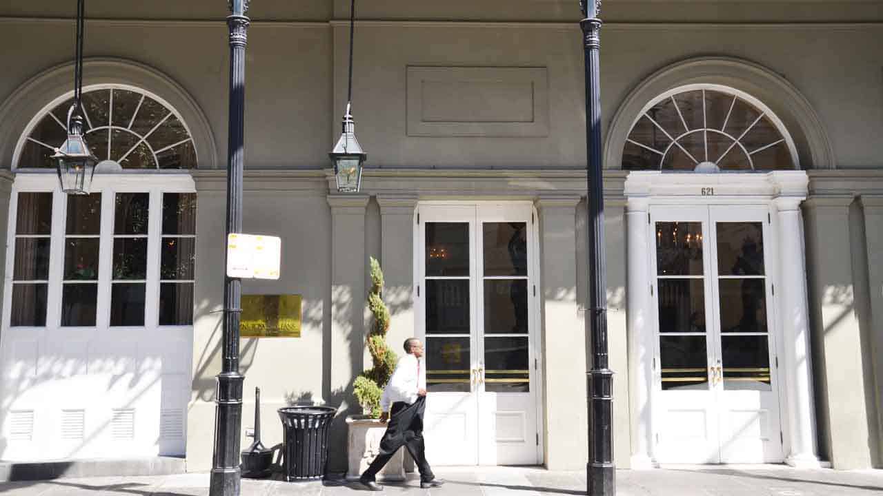 they understand how decorating with lanterns is just the right finishing touch for this New Orleans building with beautiful arched windows