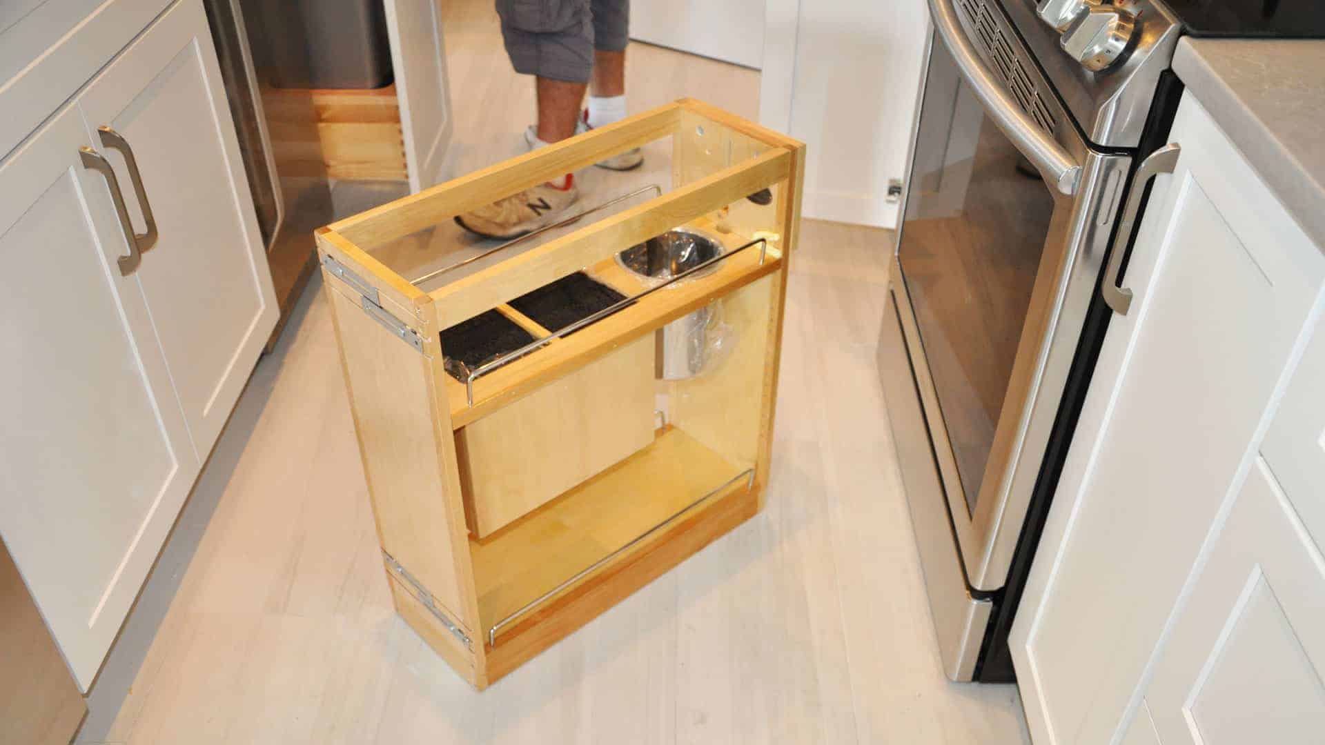 installing knife pull-out insert into cabinet next to the stove, yeah!