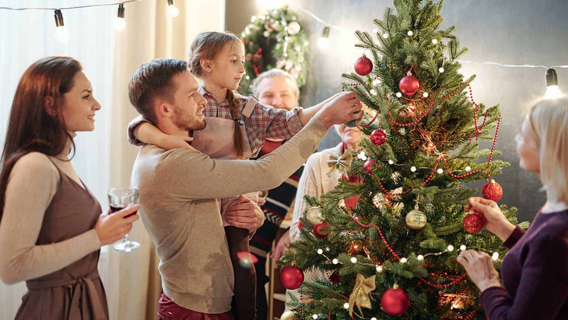 decorating the Christmas tree provides great holiday memories all year round