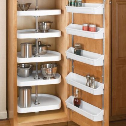 Floor to ceiling pantry cabinets with lazy susan shelves for easy access ...